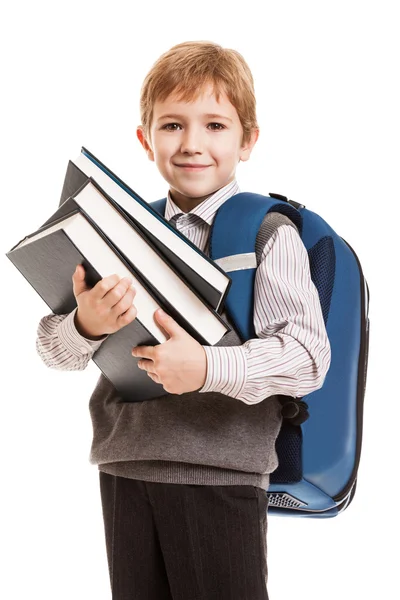 Школьник с рюкзаком, держащим книги — стоковое фото