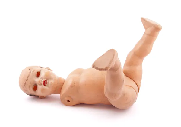 Брошенный ребенок кукла с обтравочного контура — стоковое фото
