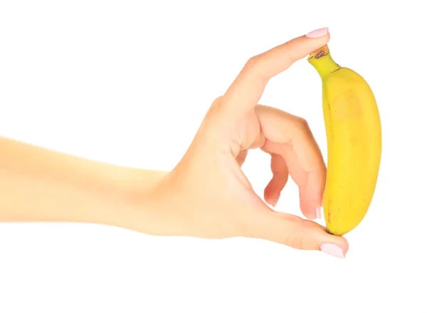 Женская рука, проведение мини-банан, изолированные на белом — стоковое фото