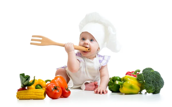 Baby шеф-повар с здорового питания овощи — стоковое фото