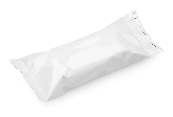 Пищевая упаковка пустой пластиковой сумке на белом — стоковое фото