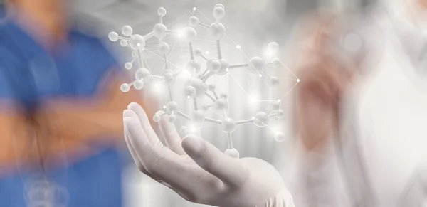 Ученый доктор рука держит виртуальный молекулярной структуры в l — стоковое фото