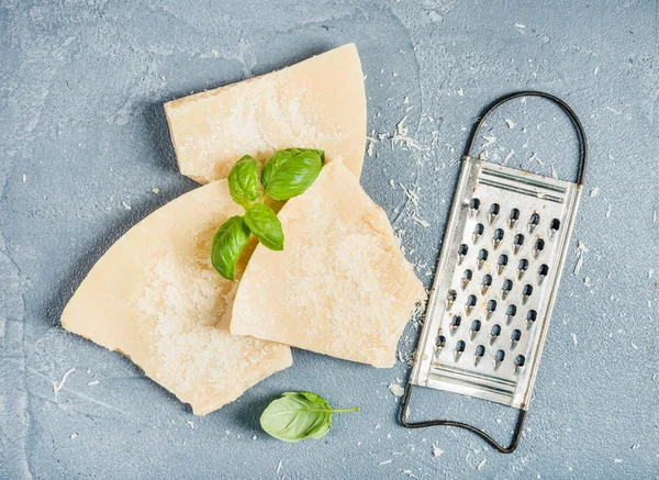 Cuts of Parmesan cheese — стоковое фото