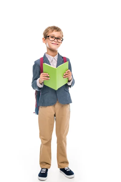 Очаровательны школьника с книгой — стоковое фото