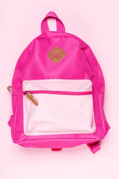 Детская розовая школьная сумка — стоковое фото