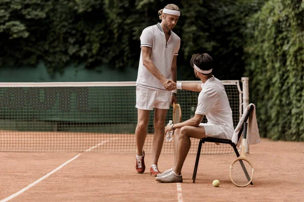 Retro Styled Tennis Players Shaking Hands Tennis Court — стоковое фото