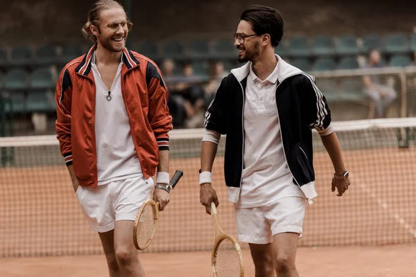 Smiling Retro Styled Tennis Players Walking Looking Each Other Tennis — стоковое фото