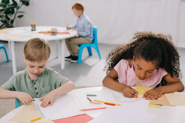 Multicultural Preschoolers Drawing Pictures Pencils Classroom — стоковое фото