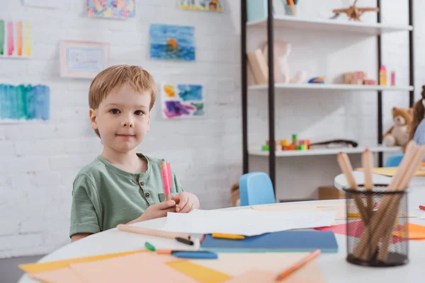 Portrait Preschooler Boy Sitting Table Paper Colorful Pencils Drawing Classroom — стоковое фото