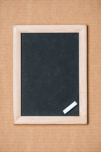Top View Empty Blackboard Piece Chalk Brown Background — стоковое фото