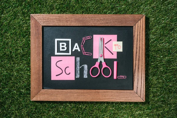 Top View Blackboard Back School Lettering Made Pink White Objects — стоковое фото