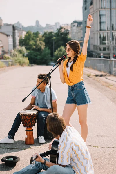 Young Happy Men Woman Buskers Playing Music City Street — стоковое фото