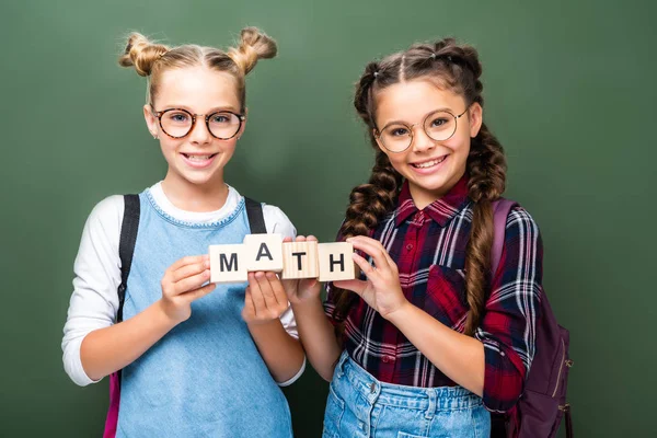 Schoolchildren Holding Wooden Cubes Word Math Blackboard — стоковое фото