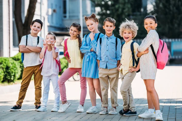 Group Adorable Pupils Posing School Garden — стоковое фото