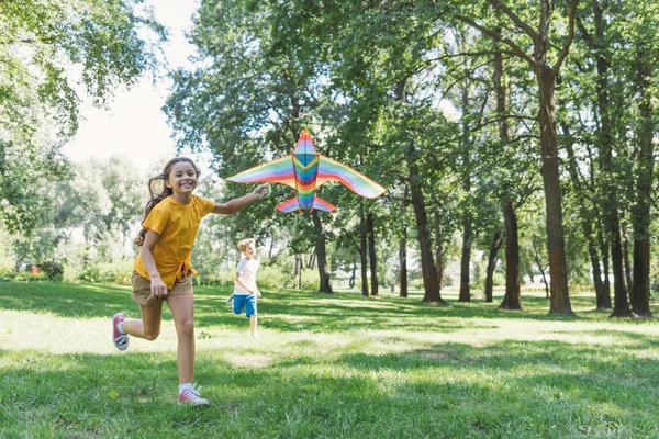 Adorable Happy Children Playing Colorful Kite Park — стоковое фото