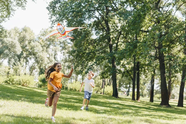 Cute Happy Kids Playing Colorful Kite Park — стоковое фото