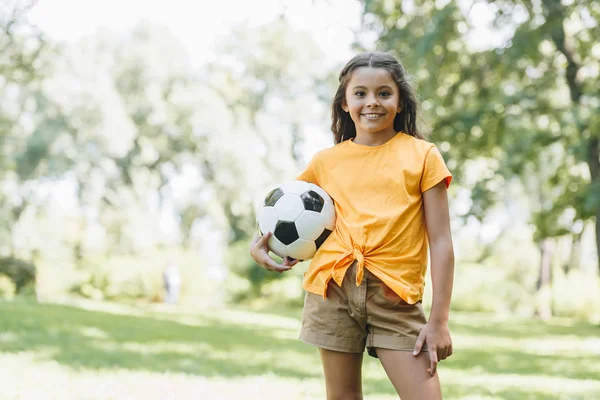 Beautiful Happy Kid Holding Soccer Ball Smiling Camera Park — стоковое фото