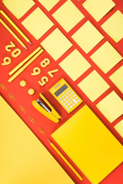 Flat Lay Arranged Yellow Schooling Supplies Rows Red — стоковое фото