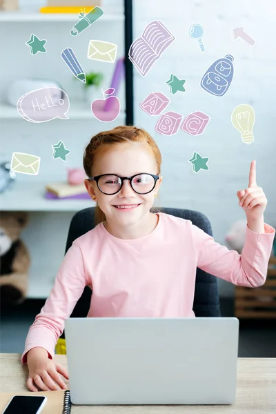 Adorable Red Haired Schoolgirl Eyeglasses Pointing Finger Smiling Camera While — стоковое фото