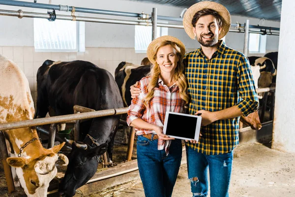 Smiling Couple Farmers Holding Tablet Blank Screen Stable — стоковое фото