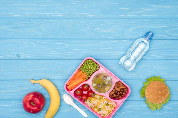 Top View Tray Kids Lunch School Bottle Water Fruits Blue — стоковое фото