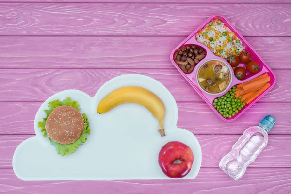 Top View Tray Kids Lunch School Burger Fruits Pink Table — стоковое фото
