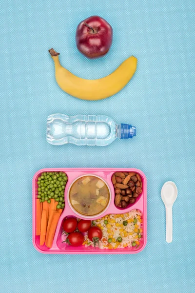 Top View Tray Kids Lunch School Bottle Water Banana Apple — стоковое фото