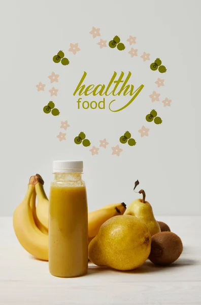 Yellow Detox Smoothie Bottles Bananas Pears Kiwis White Background Healthy — стоковое фото