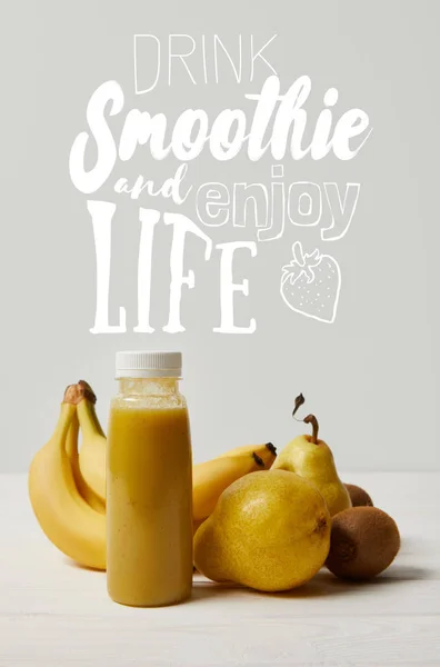 Yellow Detox Smoothie Bottles Bananas Pears Kiwis White Background Drink — стоковое фото