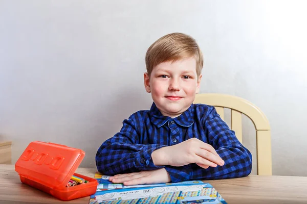 Diligent Child Dark Shirt Sitting Desk — стоковое фото