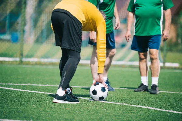 Partial View Old Men Playing Football Together Field — стоковое фото