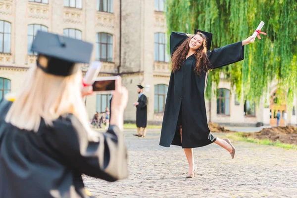 Partial View Woman Taking Picture Classmate Diploma Graduation University — стоковое фото