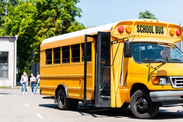School Bus Standing Parking Blurred Students Walking Background — стоковое фото