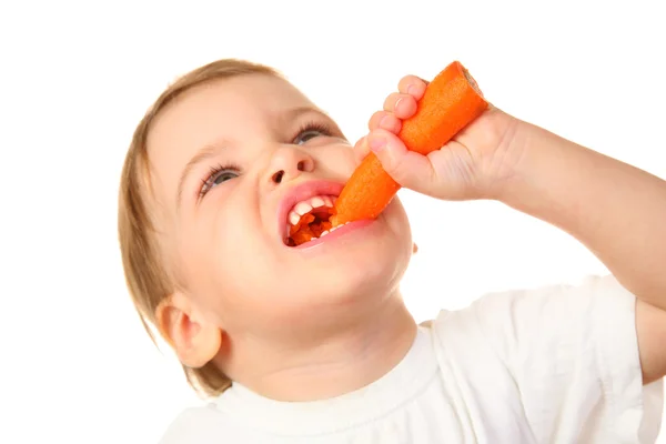 Ребенок с морковь 2 — стоковое фото