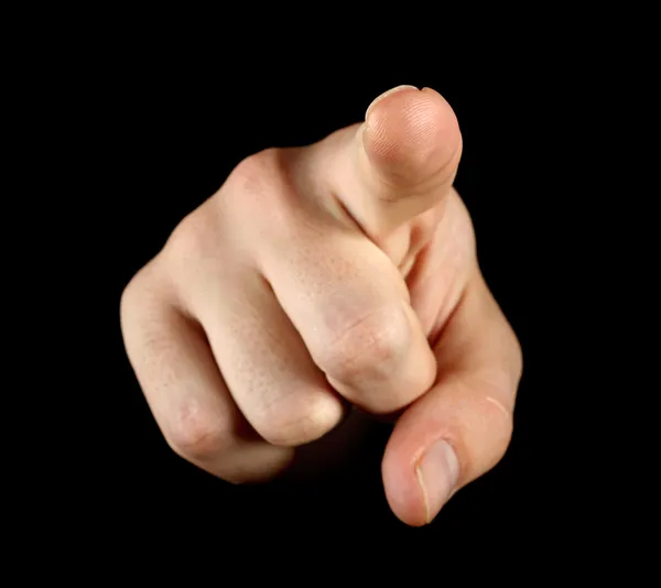 Указательный палец на черном фоне — стоковое фото