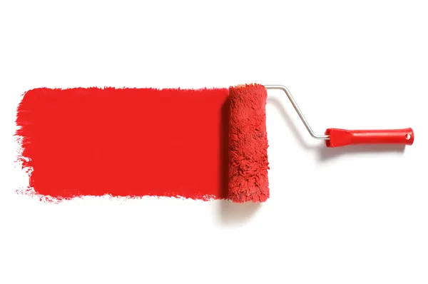 Красный ролик краски — стоковое фото