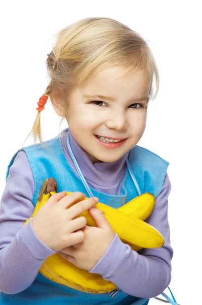Мало улыбается девушка с бананами — стоковое фото
