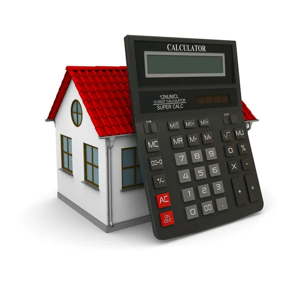 Калькулятор оперся на домик с красной крышей — стоковое фото